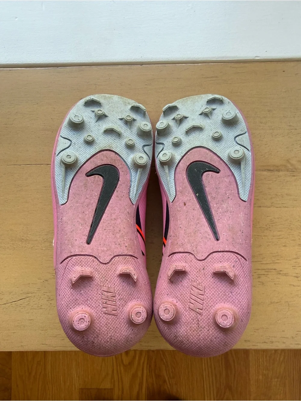 Nike Mercurial Kids Pink Soccer Cleats with Orange and Black Accents